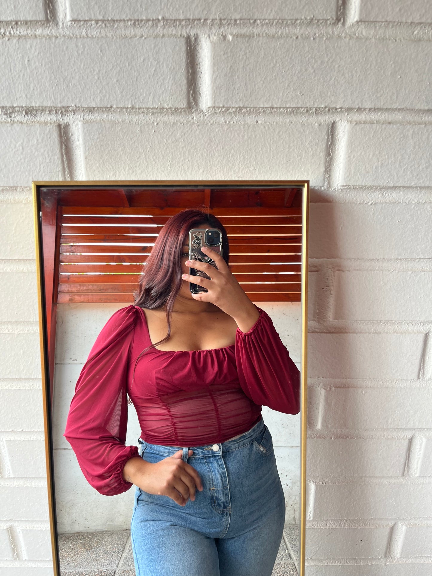 Blusa mangas aglobadas
