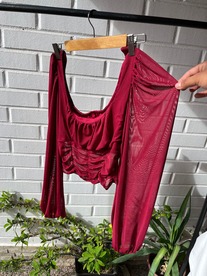 Blusa mangas aglobadas