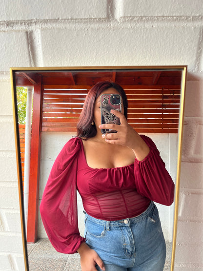 Blusa mangas aglobadas