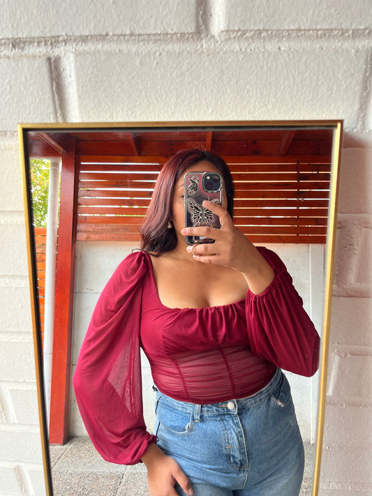 Blusa mangas aglobadas