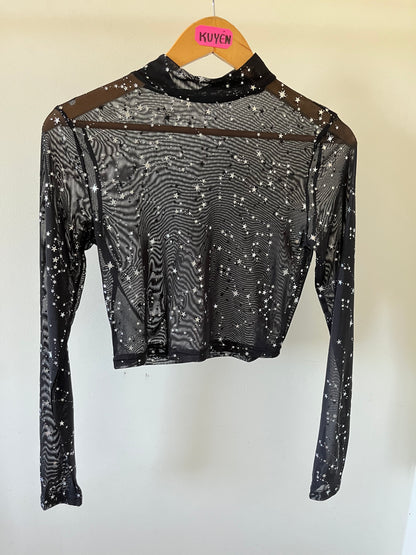 Crop top transparencia con estrellas plateadas
