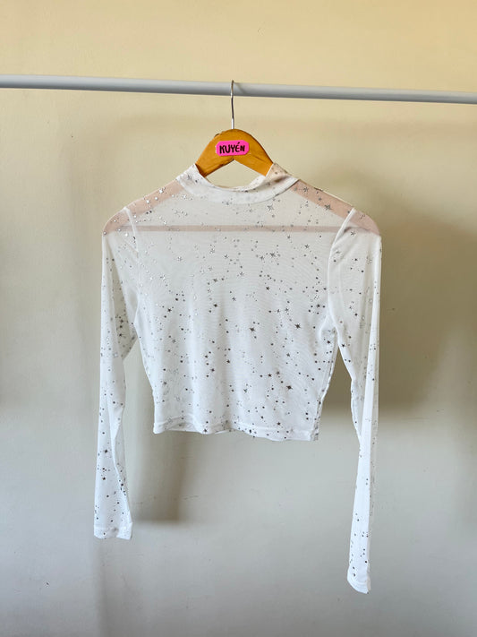 Crop top transparencia con estrellas plateadas