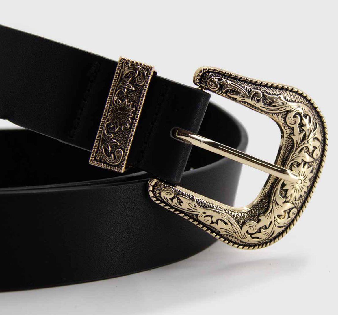 Cinturón hebilla floreada